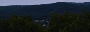 Photo of Norfolk, Connecticut, downtown at night, shot from the tower on Haystack Mountain.