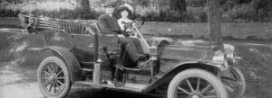 Historic photo of a couple in their new car, Norfolk, Connecticut.