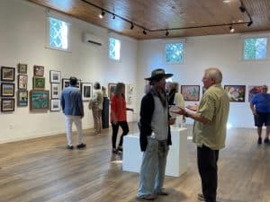 Photo of guests at an art show, Norfolk, Connecticut.
