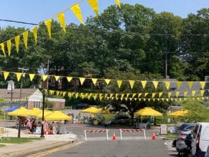 Photo of Weekend in Norfolk tents and banners, summer 2025 in Norfolk, Connecticut