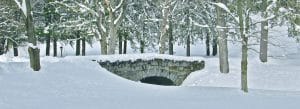 Photo of a stone bridge covered with snow, Battell Stoeckel Estate, Norfolk, Connecticut..