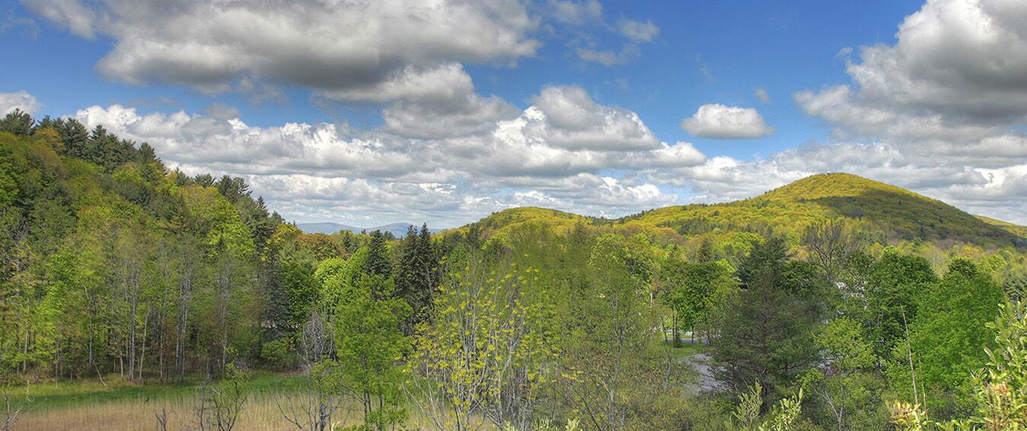 Photo of Haystack Mountain in springtime from Station Place, Norfolk, Connecticut.