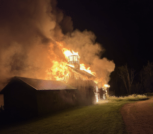 Photo of barn burning at Lost Ruby Farm, Norfolk, Conn.